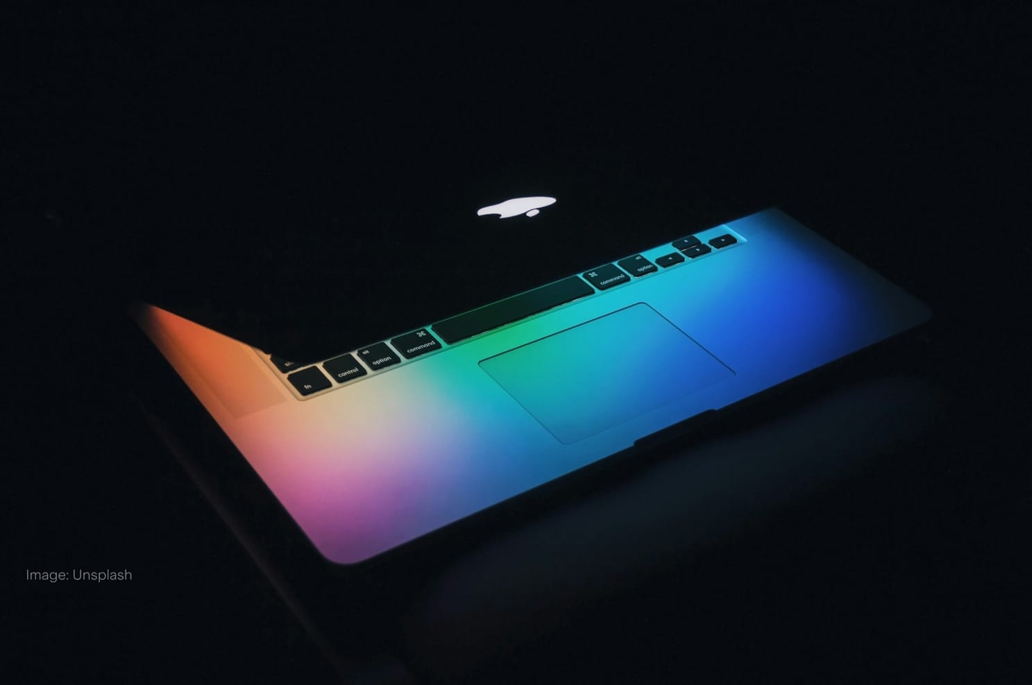 macbook-in-dark-vibrant-lights.jpg