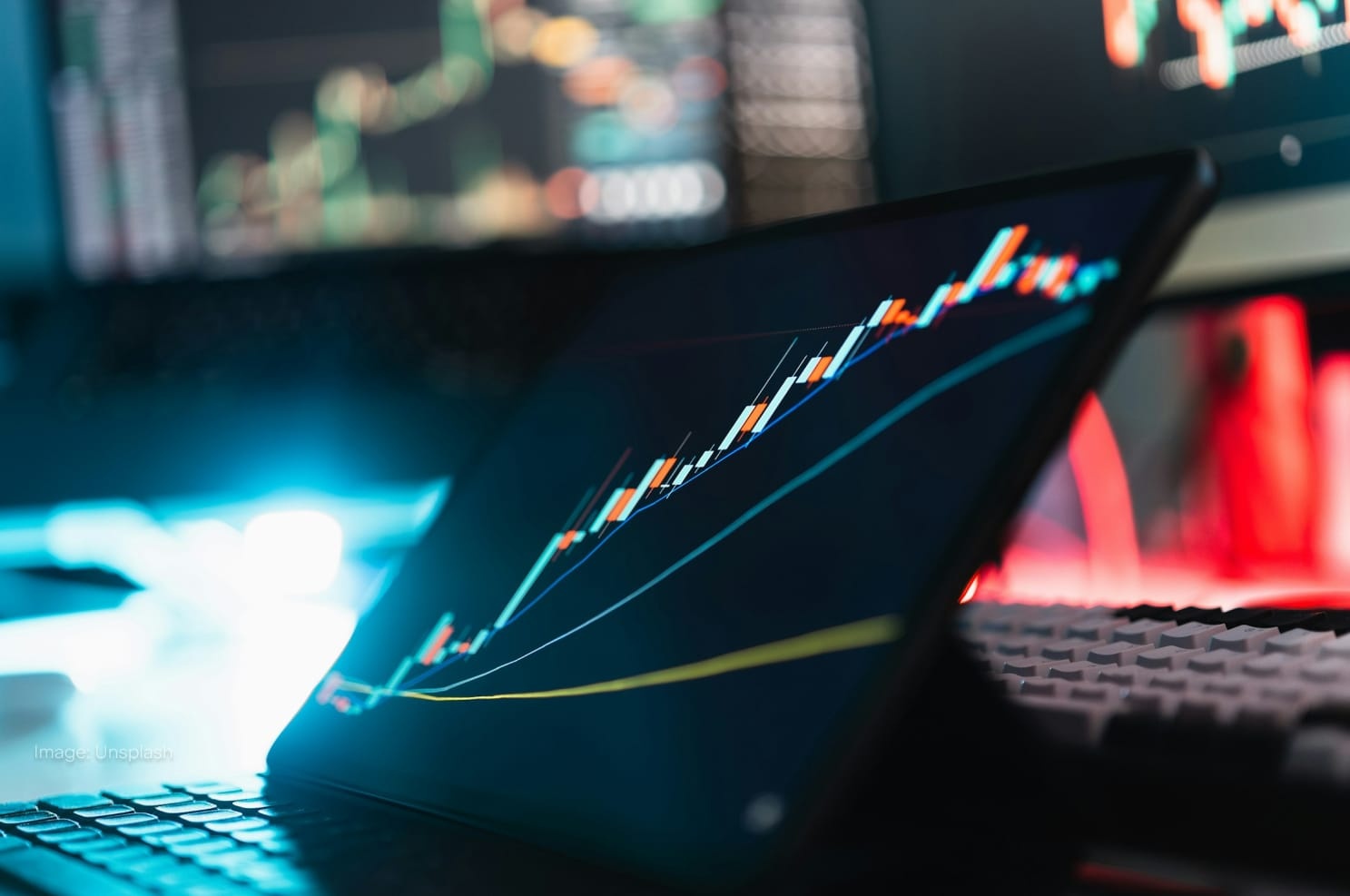 desk-with-tablet-monitors-crypto-exchange-charts.jpg