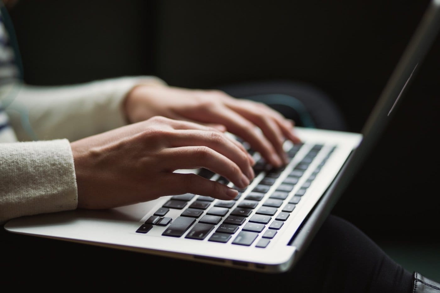 hands-typing-on-laptop-close-up.jpeg