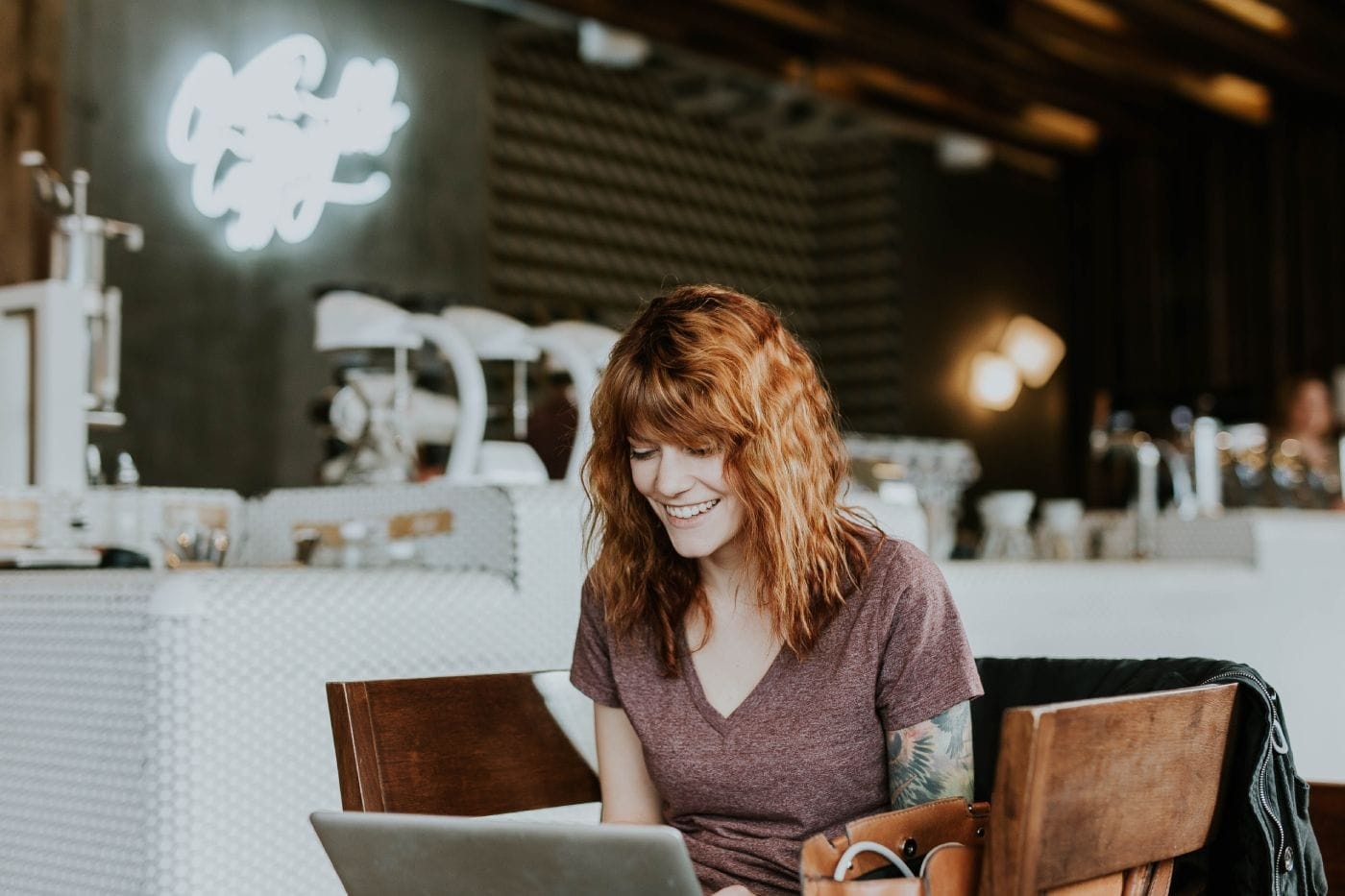 lady-sitting-in-cafe-on-laptop.jpg