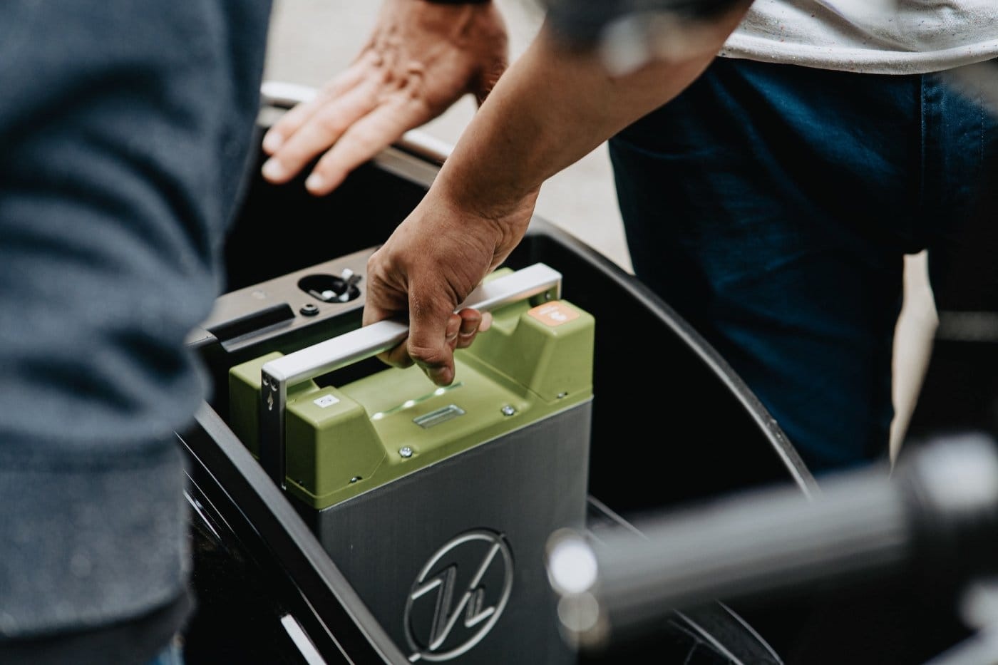 lithium-ion-battery-being-swapped-in-electric-scooter.jpg