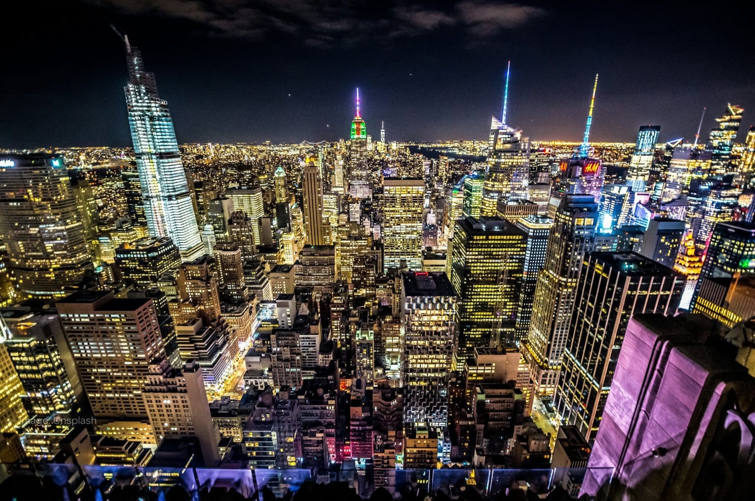 new-york-city-with-high-rise-buildings-night-time.jpg