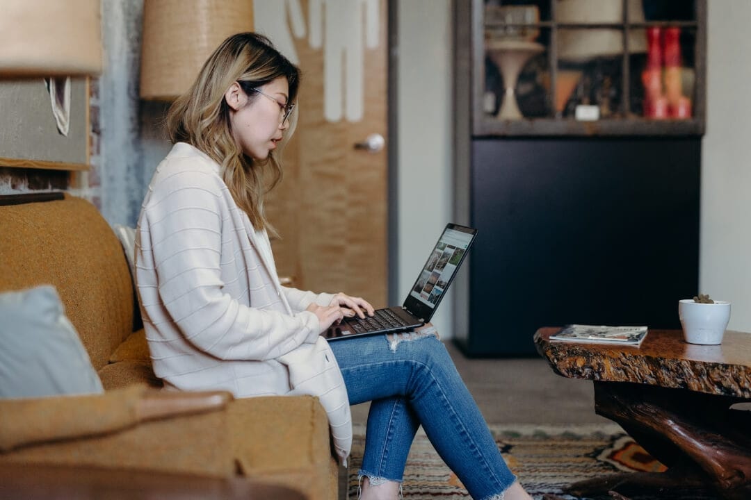 person-on-couch-working-on-laptop.jpg