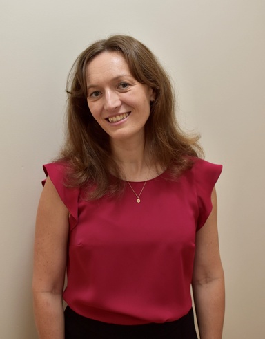 Portrait photo of Sara Allen, Markets Writer at Stake.