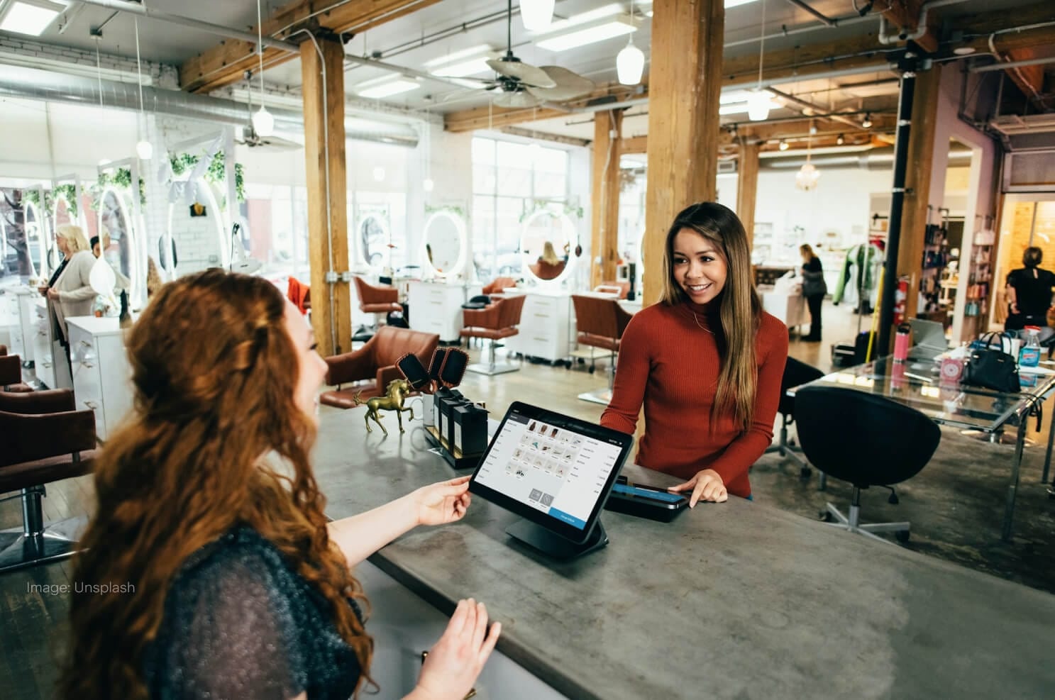 woman-at-checkout-paying.jpg