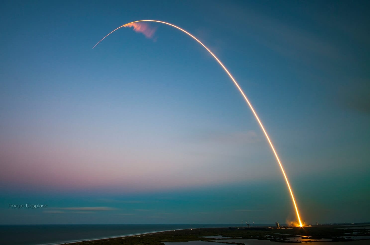 rocketship-blasting-off-into-space-with-trail-behind.jpg
